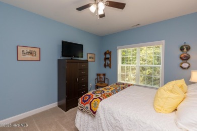 Welcome to this beautiful custom-built 4-bedroom, 3.5-bath home on Whispering Woods in North Carolina - for sale on GolfHomes.com, golf home, golf lot