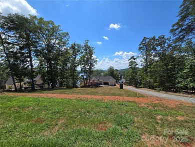 This premium Badin Lake water view lot is located in the on Old North State Club at Uwharrie Point Golf community in North Carolina - for sale on GolfHomes.com, golf home, golf lot