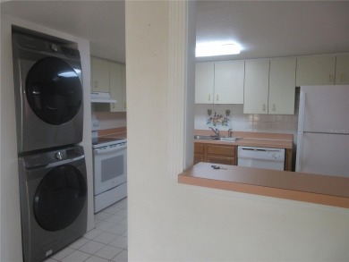 AFFORDBLE GROUND FLOOR 2/2 CONDOMINIUM JUST 500 FEET AWAY FROM on Country Club At Silver Springs Shores in Florida - for sale on GolfHomes.com, golf home, golf lot