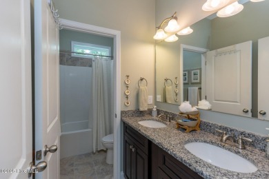 Welcome to this beautiful custom-built 4-bedroom, 3.5-bath home on Whispering Woods in North Carolina - for sale on GolfHomes.com, golf home, golf lot