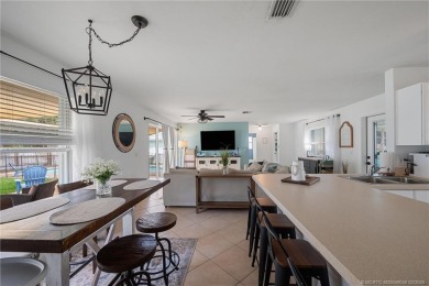 Remarkable Opportunity! Discover this Remodeled Concrete Block on Miles Grant Country Club in Florida - for sale on GolfHomes.com, golf home, golf lot