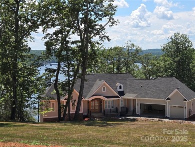 This premium Badin Lake water view lot is located in the on Old North State Club at Uwharrie Point Golf community in North Carolina - for sale on GolfHomes.com, golf home, golf lot