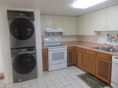 AFFORDBLE GROUND FLOOR 2/2 CONDOMINIUM JUST 500 FEET AWAY FROM on Country Club At Silver Springs Shores in Florida - for sale on GolfHomes.com, golf home, golf lot