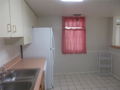 AFFORDBLE GROUND FLOOR 2/2 CONDOMINIUM JUST 500 FEET AWAY FROM on Country Club At Silver Springs Shores in Florida - for sale on GolfHomes.com, golf home, golf lot