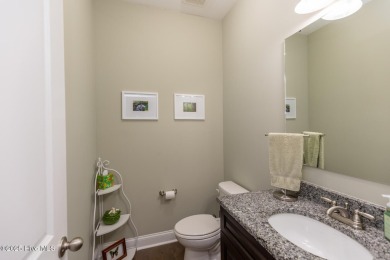 Welcome to this beautiful custom-built 4-bedroom, 3.5-bath home on Whispering Woods in North Carolina - for sale on GolfHomes.com, golf home, golf lot