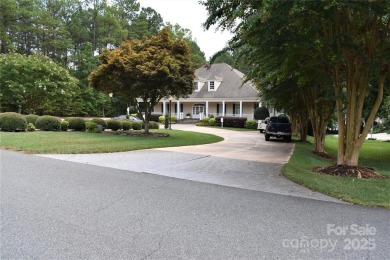 This premium Badin Lake water view lot is located in the on Old North State Club at Uwharrie Point Golf community in North Carolina - for sale on GolfHomes.com, golf home, golf lot