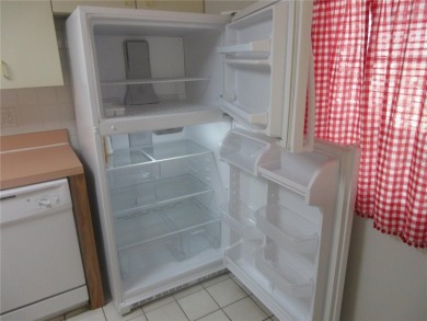 AFFORDBLE GROUND FLOOR 2/2 CONDOMINIUM JUST 500 FEET AWAY FROM on Country Club At Silver Springs Shores in Florida - for sale on GolfHomes.com, golf home, golf lot