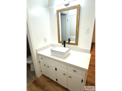 Welcome to this completely remodeled 4-bedroom, 4-bath home in on Rancho Viejo Resort and Country Club in Texas - for sale on GolfHomes.com, golf home, golf lot