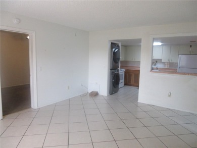 AFFORDBLE GROUND FLOOR 2/2 CONDOMINIUM JUST 500 FEET AWAY FROM on Country Club At Silver Springs Shores in Florida - for sale on GolfHomes.com, golf home, golf lot