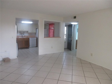 AFFORDBLE GROUND FLOOR 2/2 CONDOMINIUM JUST 500 FEET AWAY FROM on Country Club At Silver Springs Shores in Florida - for sale on GolfHomes.com, golf home, golf lot