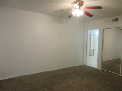 AFFORDBLE GROUND FLOOR 2/2 CONDOMINIUM JUST 500 FEET AWAY FROM on Country Club At Silver Springs Shores in Florida - for sale on GolfHomes.com, golf home, golf lot