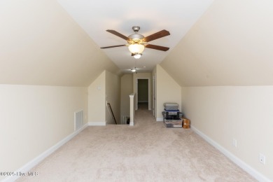 Welcome to this beautiful custom-built 4-bedroom, 3.5-bath home on Whispering Woods in North Carolina - for sale on GolfHomes.com, golf home, golf lot