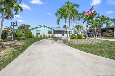 Remarkable Opportunity! Discover this Remodeled Concrete Block on Miles Grant Country Club in Florida - for sale on GolfHomes.com, golf home, golf lot