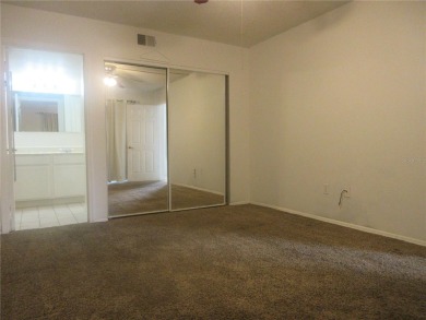 AFFORDBLE GROUND FLOOR 2/2 CONDOMINIUM JUST 500 FEET AWAY FROM on Country Club At Silver Springs Shores in Florida - for sale on GolfHomes.com, golf home, golf lot