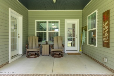 Welcome to this beautiful custom-built 4-bedroom, 3.5-bath home on Whispering Woods in North Carolina - for sale on GolfHomes.com, golf home, golf lot