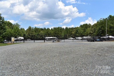 This premium Badin Lake water view lot is located in the on Old North State Club at Uwharrie Point Golf community in North Carolina - for sale on GolfHomes.com, golf home, golf lot