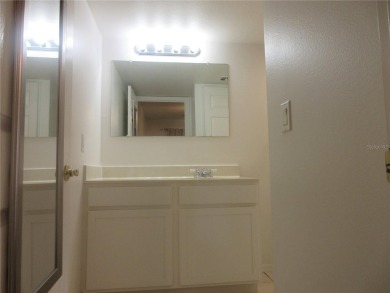 AFFORDBLE GROUND FLOOR 2/2 CONDOMINIUM JUST 500 FEET AWAY FROM on Country Club At Silver Springs Shores in Florida - for sale on GolfHomes.com, golf home, golf lot