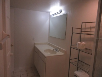 AFFORDBLE GROUND FLOOR 2/2 CONDOMINIUM JUST 500 FEET AWAY FROM on Country Club At Silver Springs Shores in Florida - for sale on GolfHomes.com, golf home, golf lot
