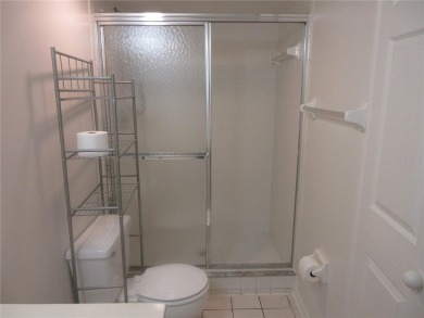 AFFORDBLE GROUND FLOOR 2/2 CONDOMINIUM JUST 500 FEET AWAY FROM on Country Club At Silver Springs Shores in Florida - for sale on GolfHomes.com, golf home, golf lot