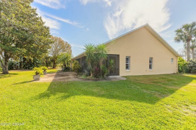 Welcome to this exceptional 3-bedroom, 2-bathroom home located on Spruce Creek Golf Club in Florida - for sale on GolfHomes.com, golf home, golf lot