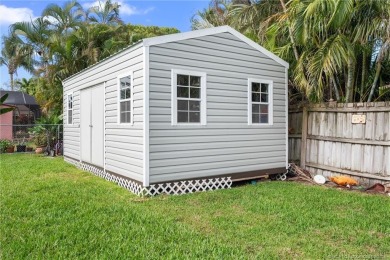 Remarkable Opportunity! Discover this Remodeled Concrete Block on Miles Grant Country Club in Florida - for sale on GolfHomes.com, golf home, golf lot