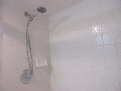 AFFORDBLE GROUND FLOOR 2/2 CONDOMINIUM JUST 500 FEET AWAY FROM on Country Club At Silver Springs Shores in Florida - for sale on GolfHomes.com, golf home, golf lot