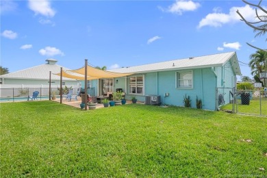 Remarkable Opportunity! Discover this Remodeled Concrete Block on Miles Grant Country Club in Florida - for sale on GolfHomes.com, golf home, golf lot