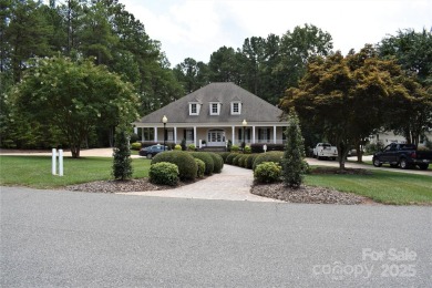 This premium Badin Lake water view lot is located in the on Old North State Club at Uwharrie Point Golf community in North Carolina - for sale on GolfHomes.com, golf home, golf lot