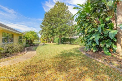 Welcome to this exceptional 3-bedroom, 2-bathroom home located on Spruce Creek Golf Club in Florida - for sale on GolfHomes.com, golf home, golf lot