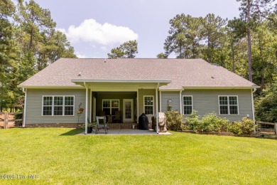 Welcome to this beautiful custom-built 4-bedroom, 3.5-bath home on Whispering Woods in North Carolina - for sale on GolfHomes.com, golf home, golf lot