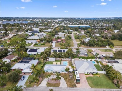 Remarkable Opportunity! Discover this Remodeled Concrete Block on Miles Grant Country Club in Florida - for sale on GolfHomes.com, golf home, golf lot