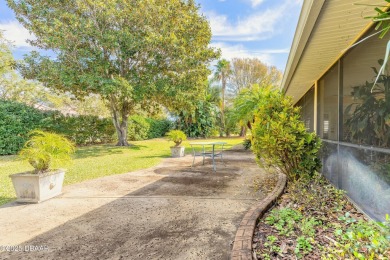 Welcome to this exceptional 3-bedroom, 2-bathroom home located on Spruce Creek Golf Club in Florida - for sale on GolfHomes.com, golf home, golf lot