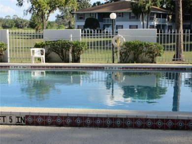 AFFORDBLE GROUND FLOOR 2/2 CONDOMINIUM JUST 500 FEET AWAY FROM on Country Club At Silver Springs Shores in Florida - for sale on GolfHomes.com, golf home, golf lot