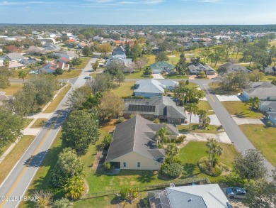 Welcome to this exceptional 3-bedroom, 2-bathroom home located on Spruce Creek Golf Club in Florida - for sale on GolfHomes.com, golf home, golf lot