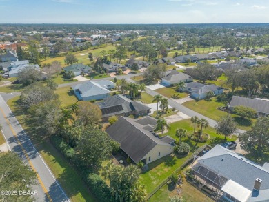 Welcome to this exceptional 3-bedroom, 2-bathroom home located on Spruce Creek Golf Club in Florida - for sale on GolfHomes.com, golf home, golf lot