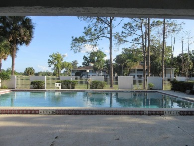 AFFORDBLE GROUND FLOOR 2/2 CONDOMINIUM JUST 500 FEET AWAY FROM on Country Club At Silver Springs Shores in Florida - for sale on GolfHomes.com, golf home, golf lot