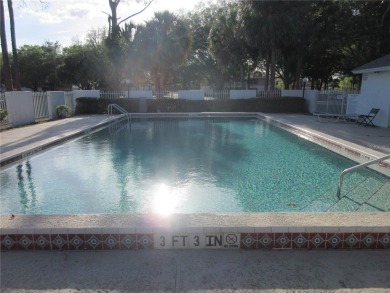 AFFORDBLE GROUND FLOOR 2/2 CONDOMINIUM JUST 500 FEET AWAY FROM on Country Club At Silver Springs Shores in Florida - for sale on GolfHomes.com, golf home, golf lot