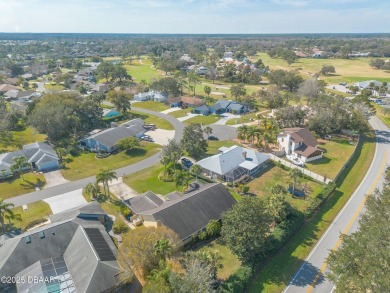 Welcome to this exceptional 3-bedroom, 2-bathroom home located on Spruce Creek Golf Club in Florida - for sale on GolfHomes.com, golf home, golf lot