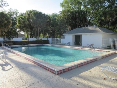 AFFORDBLE GROUND FLOOR 2/2 CONDOMINIUM JUST 500 FEET AWAY FROM on Country Club At Silver Springs Shores in Florida - for sale on GolfHomes.com, golf home, golf lot