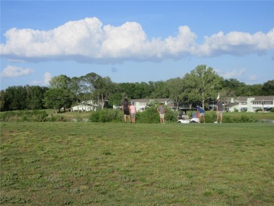 AFFORDBLE GROUND FLOOR 2/2 CONDOMINIUM JUST 500 FEET AWAY FROM on Country Club At Silver Springs Shores in Florida - for sale on GolfHomes.com, golf home, golf lot