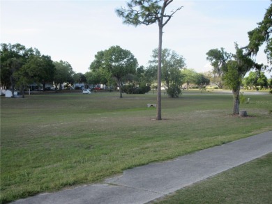 AFFORDBLE GROUND FLOOR 2/2 CONDOMINIUM JUST 500 FEET AWAY FROM on Country Club At Silver Springs Shores in Florida - for sale on GolfHomes.com, golf home, golf lot