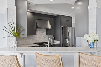 Perched on the top floor with panoramic views of Lake Powell, a on Sharks Tooth Golf Club in Florida - for sale on GolfHomes.com, golf home, golf lot