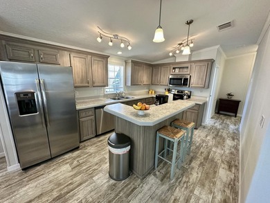 2019 Double-Wide in popular 55+ West Lakes of Boca Raton on Boca Grove Golf and Tennis in Florida - for sale on GolfHomes.com, golf home, golf lot