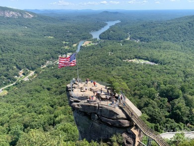 Build your mountain house or cabin in a community with amenities on Lake Lure Municipal Golf Course in North Carolina - for sale on GolfHomes.com, golf home, golf lot