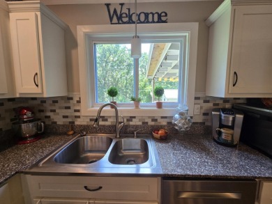 Nicely remodeled well maintained home has it all with an open on Shadow Lake Golf and Country Club in Missouri - for sale on GolfHomes.com, golf home, golf lot