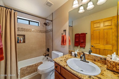 Luxury living meets low-maintenance ease in this free-standing on Pinetop Lakes Golf and Country Club in Arizona - for sale on GolfHomes.com, golf home, golf lot