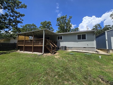 Nicely remodeled well maintained home has it all with an open on Shadow Lake Golf and Country Club in Missouri - for sale on GolfHomes.com, golf home, golf lot