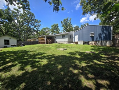 Nicely remodeled well maintained home has it all with an open on Shadow Lake Golf and Country Club in Missouri - for sale on GolfHomes.com, golf home, golf lot
