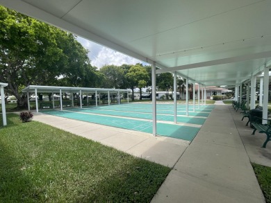 2019 Double-Wide in popular 55+ West Lakes of Boca Raton on Boca Grove Golf and Tennis in Florida - for sale on GolfHomes.com, golf home, golf lot