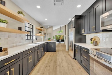 Welcome to this beautifully renovated 3-bedroom, 2.5-bath home on Tuscawilla Country Club in Florida - for sale on GolfHomes.com, golf home, golf lot